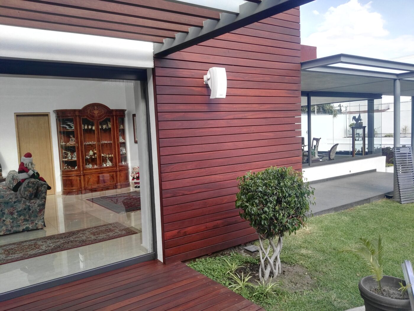Restored wooden deck against house facade