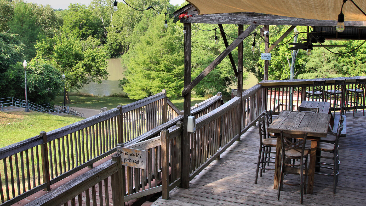Wooden backyard deck with outdoor kitchen